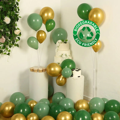 Biodegradable green and gold balloons with cake and decor in a festive setting. #whtbkgd