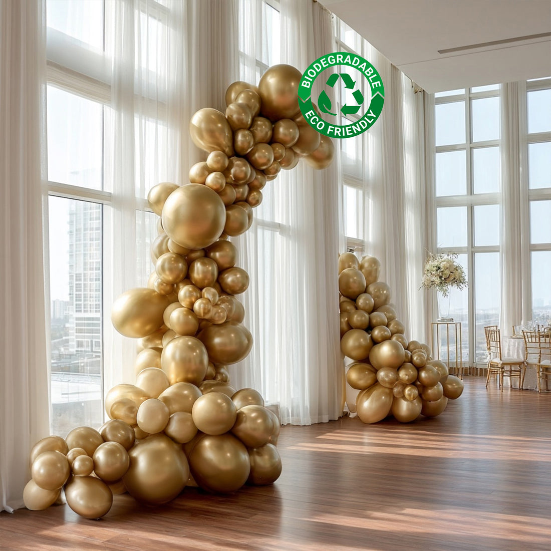Eco-friendly biodegradable gold balloon arch for events and celebrations.
