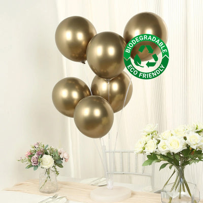 Gold biodegradable balloons in a stylish arrangement.