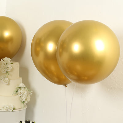 Two gold balloons in a festive setting.