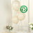 Biodegradable cream balloons displayed at a table setting.