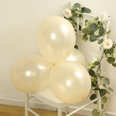 Cream balloons arranged on a chair with floral decor.