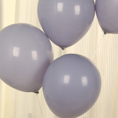 Lavender balloons grouped together against a soft background.