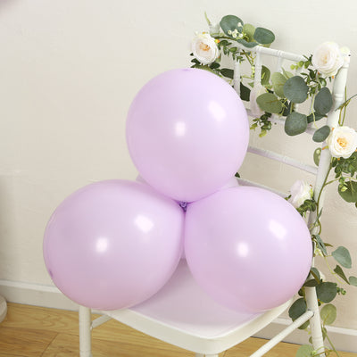 Three lavender balloons on a white chair with floral decor.