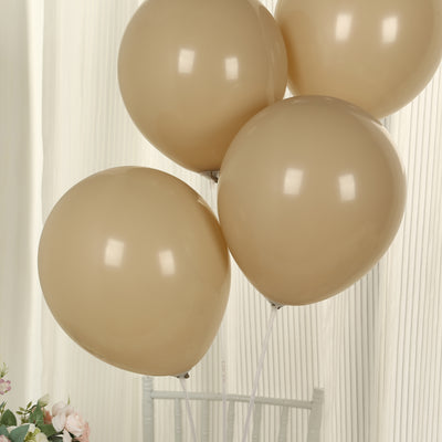 Beige balloons tied together for celebrations or events.