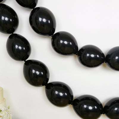 Black balloon garland decoration for parties and events