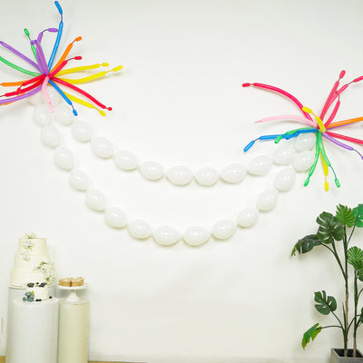 Colorful balloon garland decoration for parties with vibrant accents.