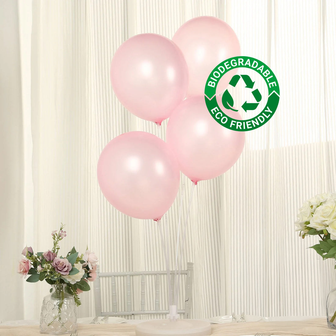 Pink biodegradable balloons with eco-friendly label