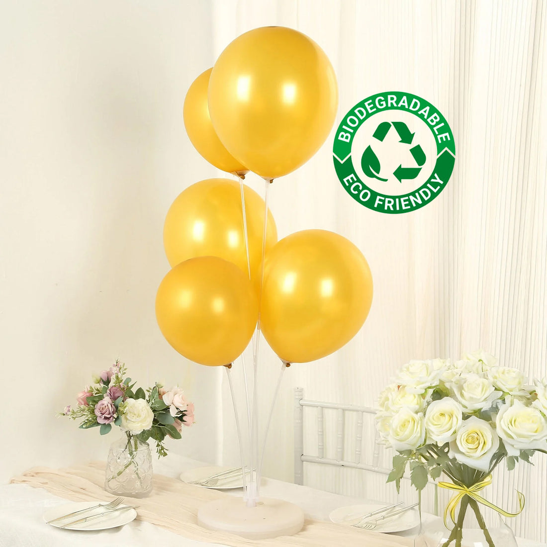 Eco-friendly biodegradable gold balloons in a decorative arrangement.