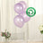 Purple biodegradable balloons with eco-friendly label on a white backdrop.