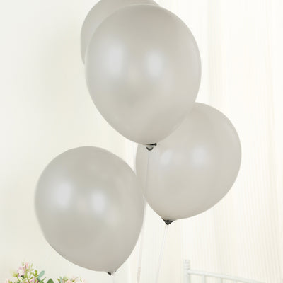 Gray balloons in a studio setting, perfect for celebrations.