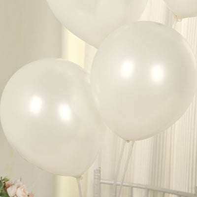 White balloons in a soft, elegant arrangement.
