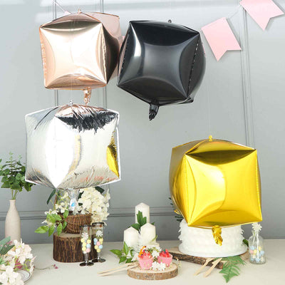 Colorful square foil balloons in gold, silver, black, and rose gold.