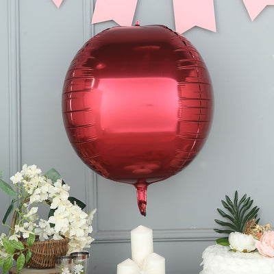 Red round foil balloon decoration for parties and celebrations.