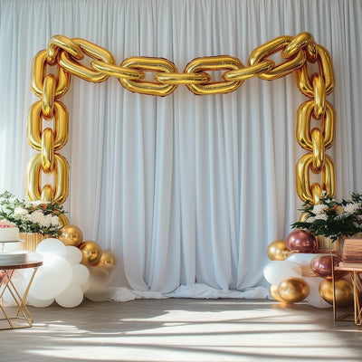 Gold chain balloon arch decoration for events and celebrations.