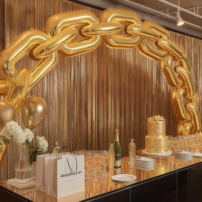 Golden balloon chain decoration at a stylish event setup.
