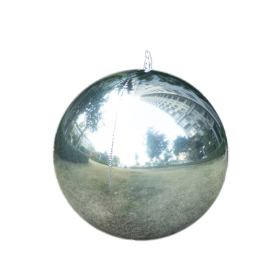 Reflective silver garden orb with a clear view of surroundings
