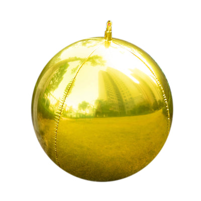 Shiny gold reflective ball on a white background