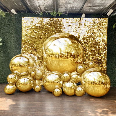 Gold decorative spheres arranged in a festive display.
