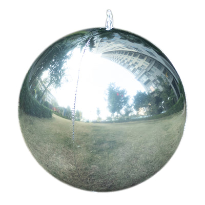 Reflective silver ornament hanging outdoors