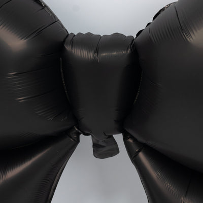 Black balloon bow decoration for parties and events