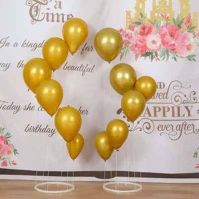 Gold balloons in a whimsical arrangement for celebrations or events.