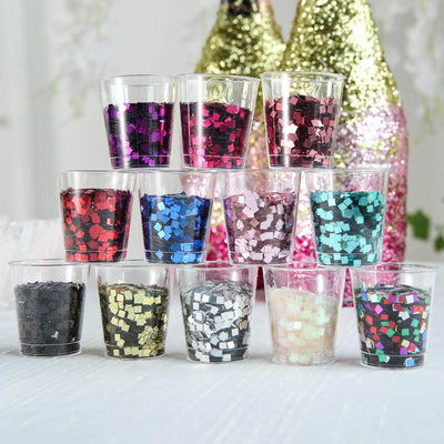 Colorful confetti-filled cups stacked for decoration or party use.