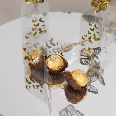 Decorative gift boxes with chocolates and butterfly designs