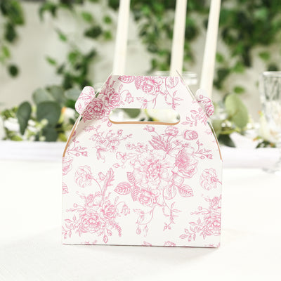 Floral patterned gift box with handle on a table setting.