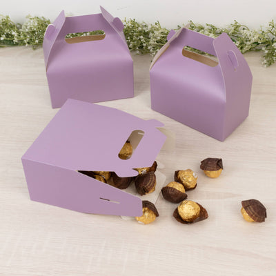 Purple gift boxes with chocolates spilling out