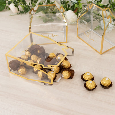 Clear gift box with Ferrero Rocher chocolates and elegant gold accents.