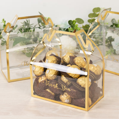 Clear gift box filled with chocolate truffles, labeled "Thank You."