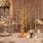Gold tree centerpiece with crystal drops on elegant wedding table decor