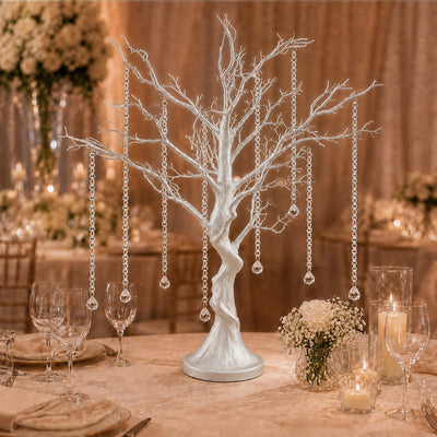 White crystal tree centerpiece with hanging gems at elegant wedding table