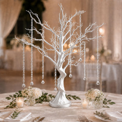 Silver tree centerpiece with crystal chains and elegant wedding table decor