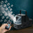 Bubble machine with remote control, producing bubbles in the air.