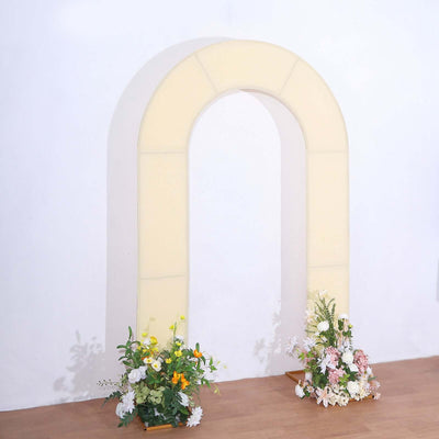 Archway display with floral arrangements on either side.