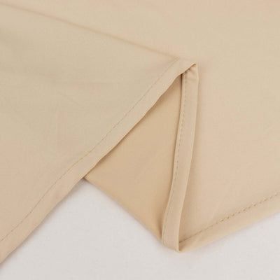 Beige fabric corner with clean stitching details.