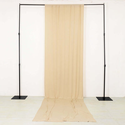 Beige backdrop fabric on a frame for photography or staging purposes.
