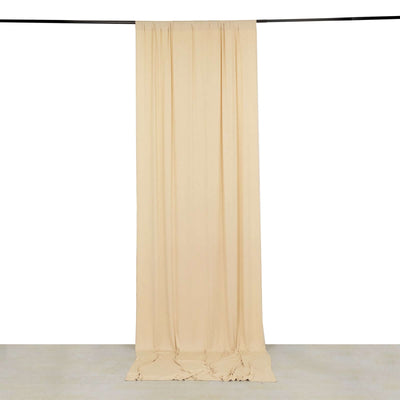 Beige fabric drape hanging from a rod against a plain white background