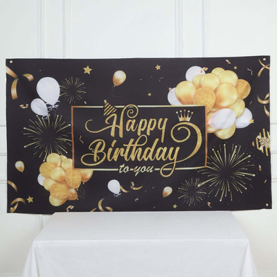 Happy Birthday banner with balloons and festive decorations.
