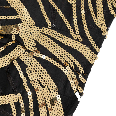 Gold sequin pattern on black fabric.