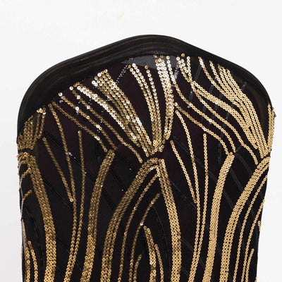 Black and gold sequined fabric with a wavy pattern