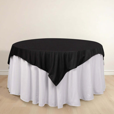 Black and white round tablecloth on a circular table