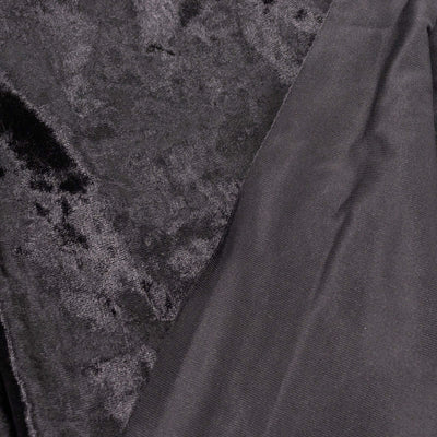 Black fabric texture featuring plush and smooth materials.