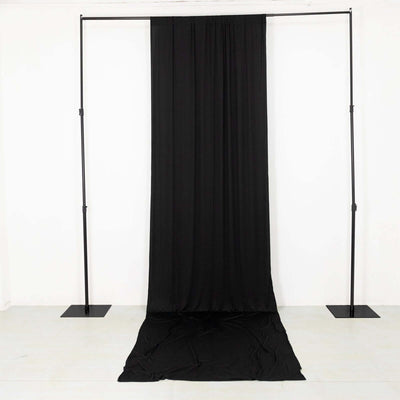 Black backdrop drape setup for photography and staging