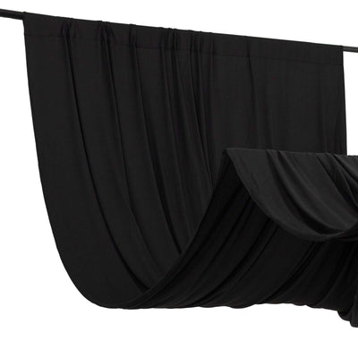 Black fabric draped elegantly for photography or staging purposes