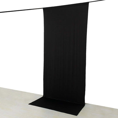 Black backdrop fabric for photography and staging use.