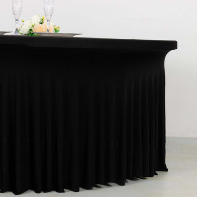 Black tablecloth with elegant pleats for events and dining setups.