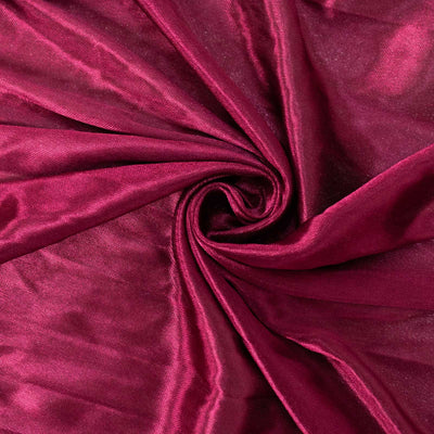 Burgundy satin fabric with a smooth, lustrous finish.